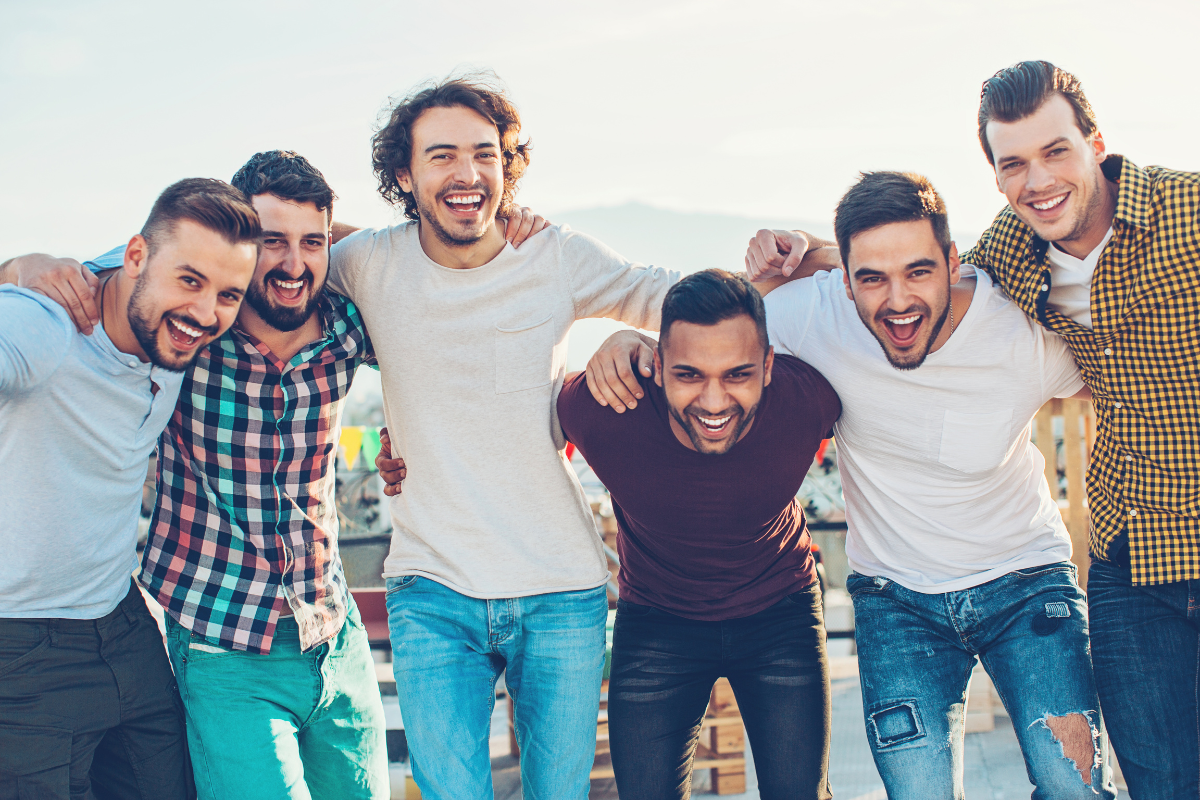 A group of men laughing together