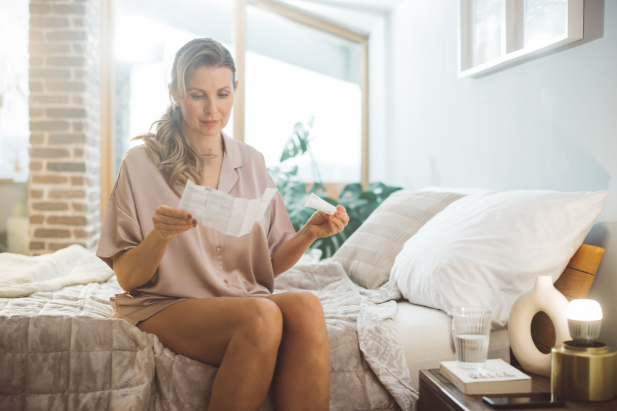 A patient reading instructions on her BHRT medication and how to balance her progesterone and oestrogen