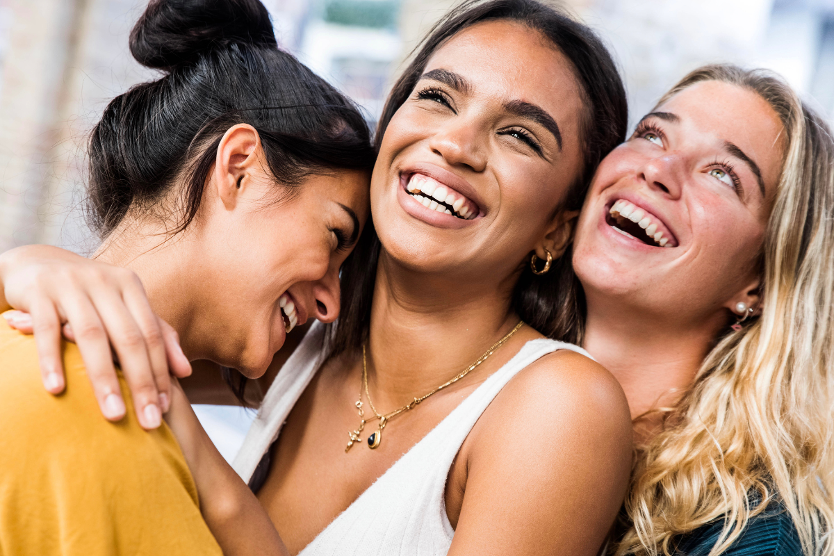 Three smiling women after getting treatemnt for low progesterone